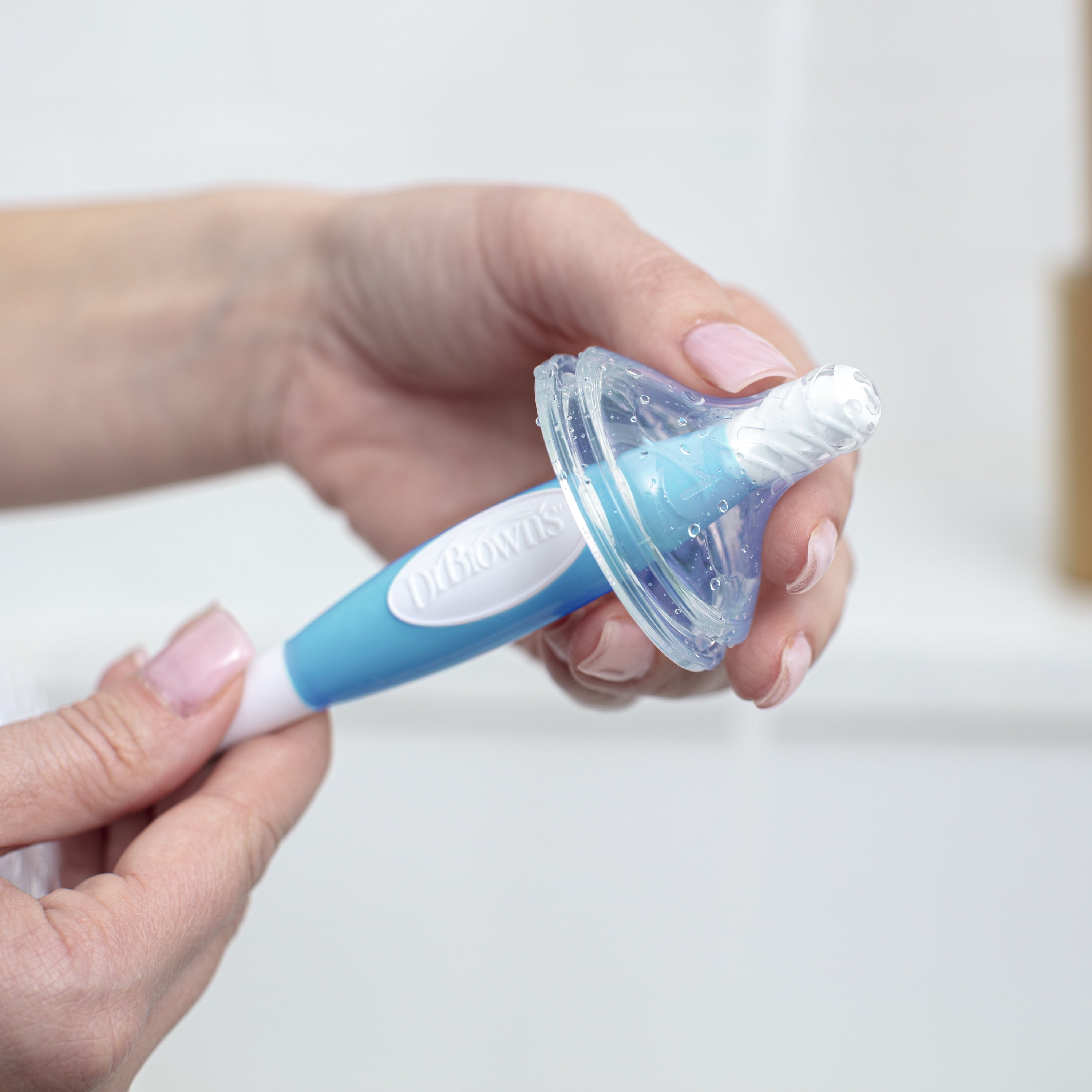 Dr. Brown's Baby Bottle Brush with Suction Cup Stand, Sponge, Scrubber and Nipple Cleaner Blue, 1 Pack